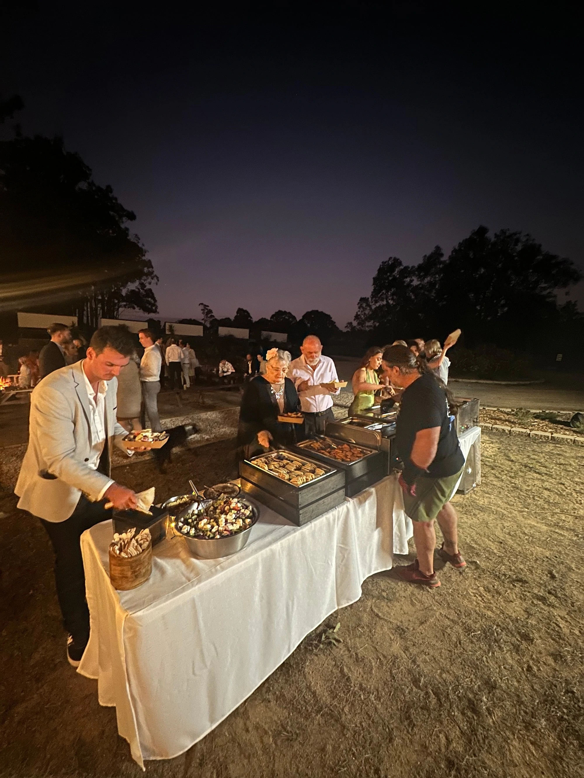 Traditional Greek catering spread with moussaka, souvlaki, gyros, spanakopita, and tzatziki, perfect for weddings and corporate functions or any event.